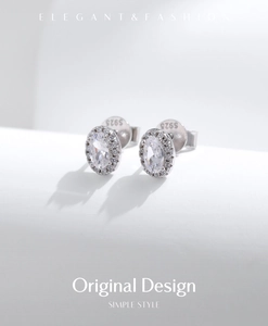 Macro shot of S925 sterling silver stamp on elegant oval cubic zirconia stud earrings