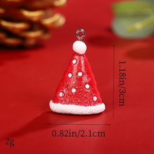 Macro view of a red glitter Christmas hat charm with dimensions 3cm by 2.1cm