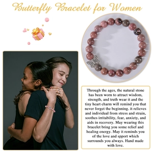 Detail of 8mm pink zebra stone bracelet with butterfly charm and female lifestyle scene