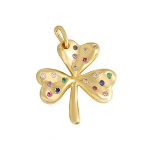Detailed macro view of a gold clover pendant set with vibrant multi-colored zircons