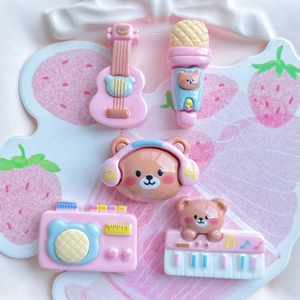 DIY resin accessory set featuring pink cartoon bears and musical instruments for phone cases