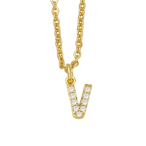 Macro detail of 18K gold letter V pendant necklace with sparkling zircon stone inlay