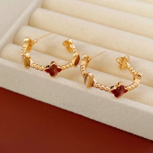 18k gold plated C-shaped earrings featuring red enamel floral motifs and zircon studs