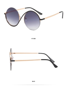 Detail view of round metal semi-rimless blue light glasses with purple gradient lenses