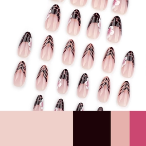 Long almond press-on nails with leopard print and floral patterns on nude base