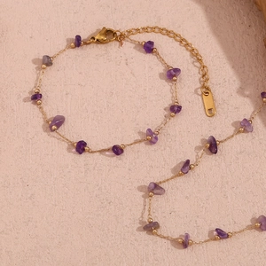 Close-up of 18K gold plated bracelet with purple natural stones and adjustable clasp