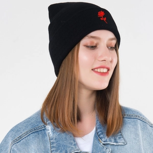 Women's black knit beanie with red rose embroidery for casual fashion styling