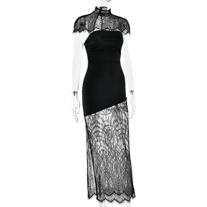 Close-up of the delicate black lace neckline and sheer fabric details on the dress