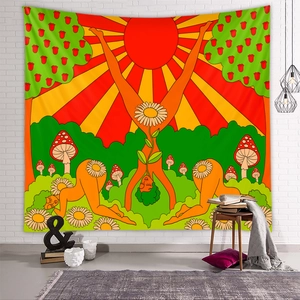 Detail of bohemian psychedelic wall tapestry featuring vintage colorful sun and floral art