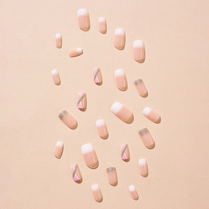 Pink glitter gradient press-on nails set with geometric patterns on matte background