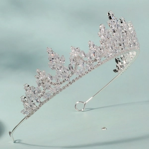 Detailed view of silver bridal crown with zircon crystals and side fastening loops