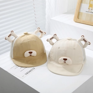 Detail of baby summer sun cap with mesh panels and cute 3D bear ears decoration