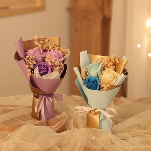 Mini soap rose and dried gypsophila bouquets in purple and blue gift packaging