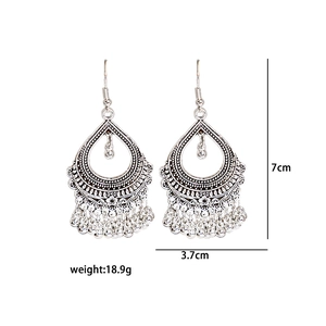 Detail view of vintage silver tassel earrings with boho patterns, size 7x3.7cm and weight 18.9g