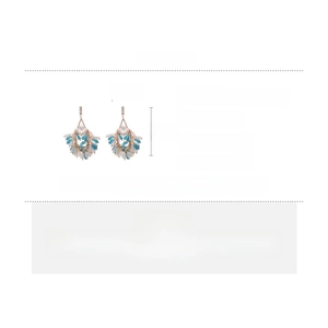 Detailed view of beaded fringe earrings with zircon crystals and silver pins
