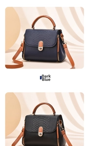 Detail of navy and brown mini handbag featuring crocodile and litchi leather textures