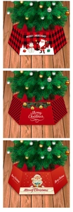 Detail of festive Christmas tree collar featuring red buffalo plaid and Santa Claus prints