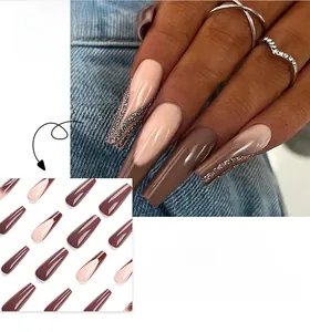 Long coffin press-on nails in dark brown and nude pink with silver glitter line detail
