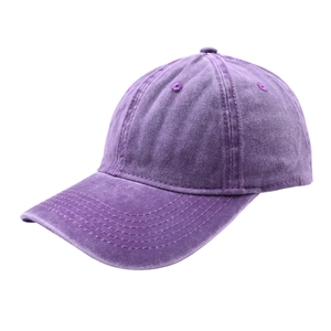 Detail of purple washed cotton baseball cap with vintage finish and adjustable buckle