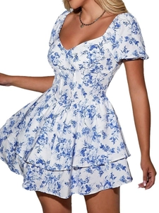 Floral puff sleeve mini dress with sweetheart neckline and ruffled hem on white background