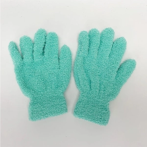 Close-up of mint green chenille winter gloves with soft plush texture and ribbed cuffs
