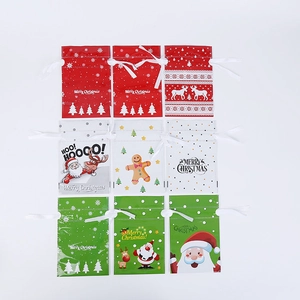 Christmas drawstring candy bags with 9 festive holiday designs and white ribbons