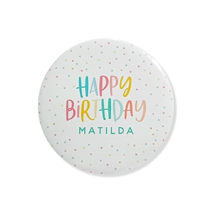 Detail of custom Happy Birthday badge with colorful polka dots and Matilda name