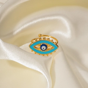18K gold plated evil eye open ring with blue enamel on elegant white silk background