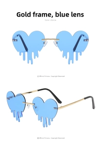 Detail of gold metal frames and blue heart-shaped dripping lenses on unique sunglasses