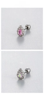 Macro detail of pear-cut crystal stud earrings with screw back design in titanium steel