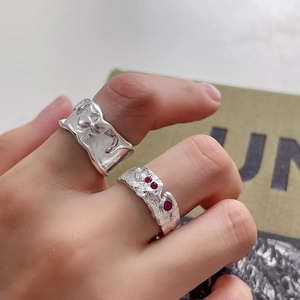 Minimalist 925 sterling silver irregular lava rings with three red zircon stone accents