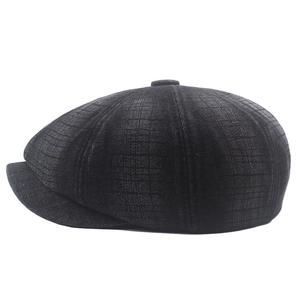 Classic dark gray plaid newsboy cap with vintage octagonal design and short brim