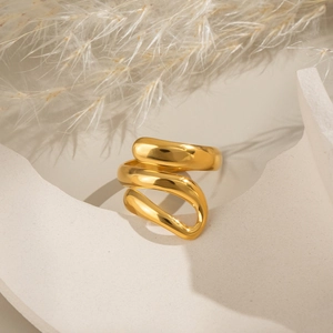 Minimalist three-layer spiral snake ring in gold stainless steel with a high-polish finish