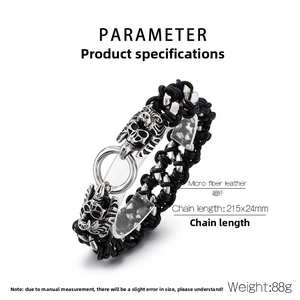 Detail view of punk skull braided leather bracelet with silver clasp and metal accents