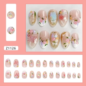 French floral press-on nails with 3D flowers, pearls, and pink butterfly accents