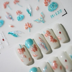 3D embossed lotus nail stickers with iridescent finish and floral petal designs