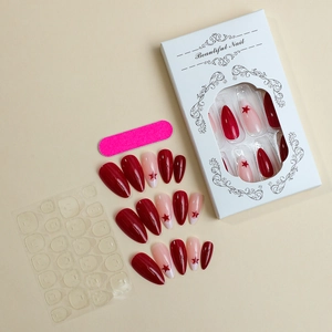 Set de uñas postizas almendradas con estrellas rojas, pegatinas de gel y mini lima de uñas