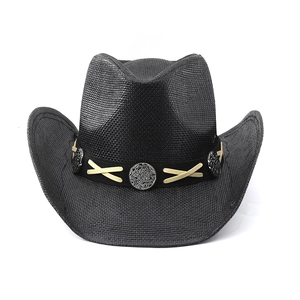 Detail of western straw cowboy hat with vintage silver conchos and brown stitching