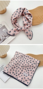 Pink cotton-linen square scarf featuring blue wave trim and floral patterns