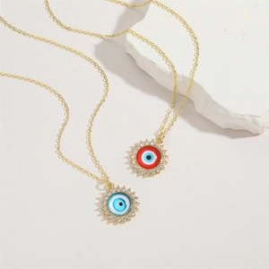 Minimalist sunburst evil eye pendant necklace with blue and red zircon inlay set