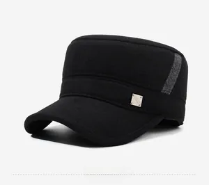 Detailed close-up of thick woolen military cap with metal buckle and grey trim decor
