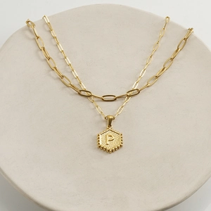 18K gold plated double layer necklace featuring an initial P hexagonal pendant
