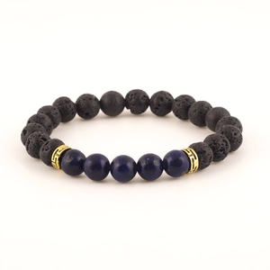 Natural lava stone and lapis lazuli beaded bracelet with gold spacer charms.