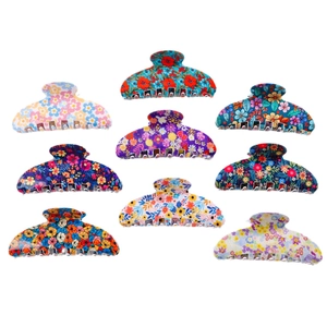 Floral print hair claws set featuring nine colorful daisy patterns for elegant hair styling