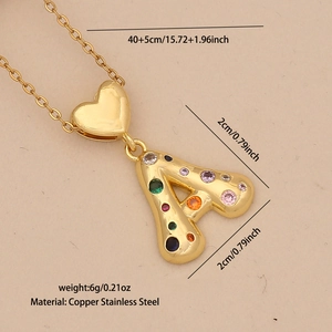 Macro shot of gold letter A pendant with multicolor zircon and necklace dimensions