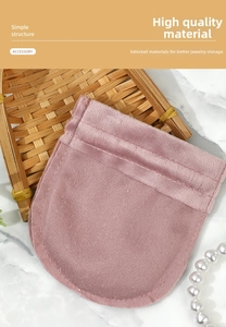 Detail of pink velvet jewelry pouch with soft texture for necklaces and earrings