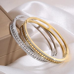 Luxurious gold and silver stainless steel hinged bangles with sparkling rhinestones