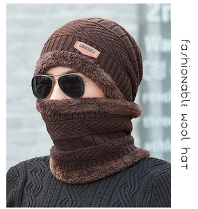 Detail of dark brown knitted hat and neck warmer set with thick fleece lining
