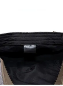 Close-up of the inner hat care label showing 30% cotton and 70% polyester material blend