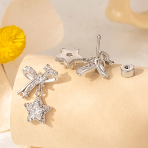 Silver bow and star drop earrings with zircons and screw back studs for women